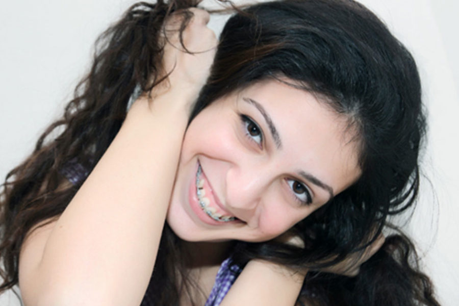 teenage girl smiling with braces