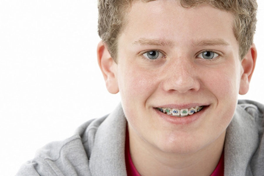 young boy with braces