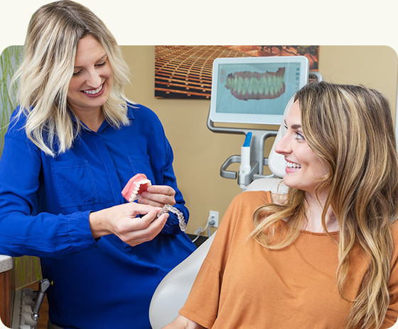 Dr. Cronin with patient explaining Invisalign procedure