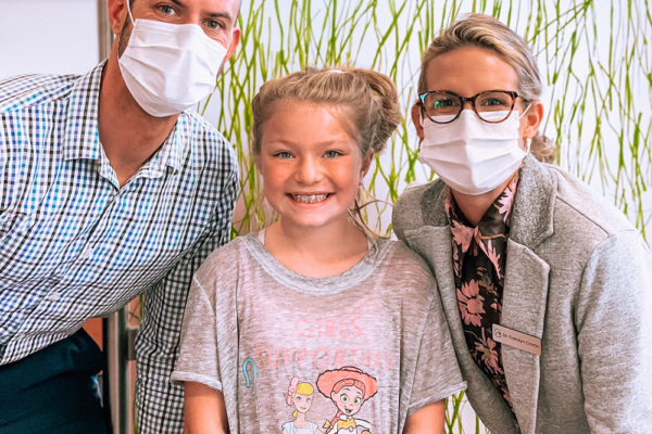 Dr. Cronin and Czarnik with girl braces patient